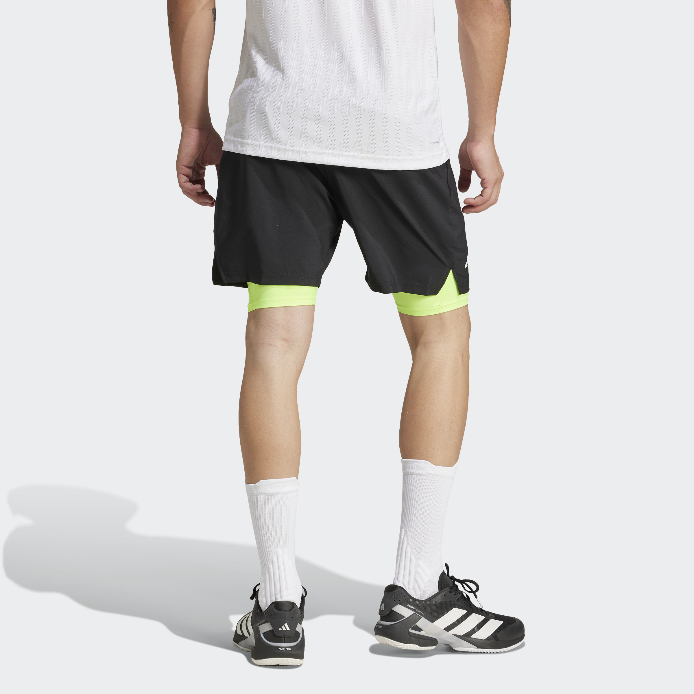 SHORT CLUB 2 EN 1 ADIDAS NOIR ET JAUNE HOMME