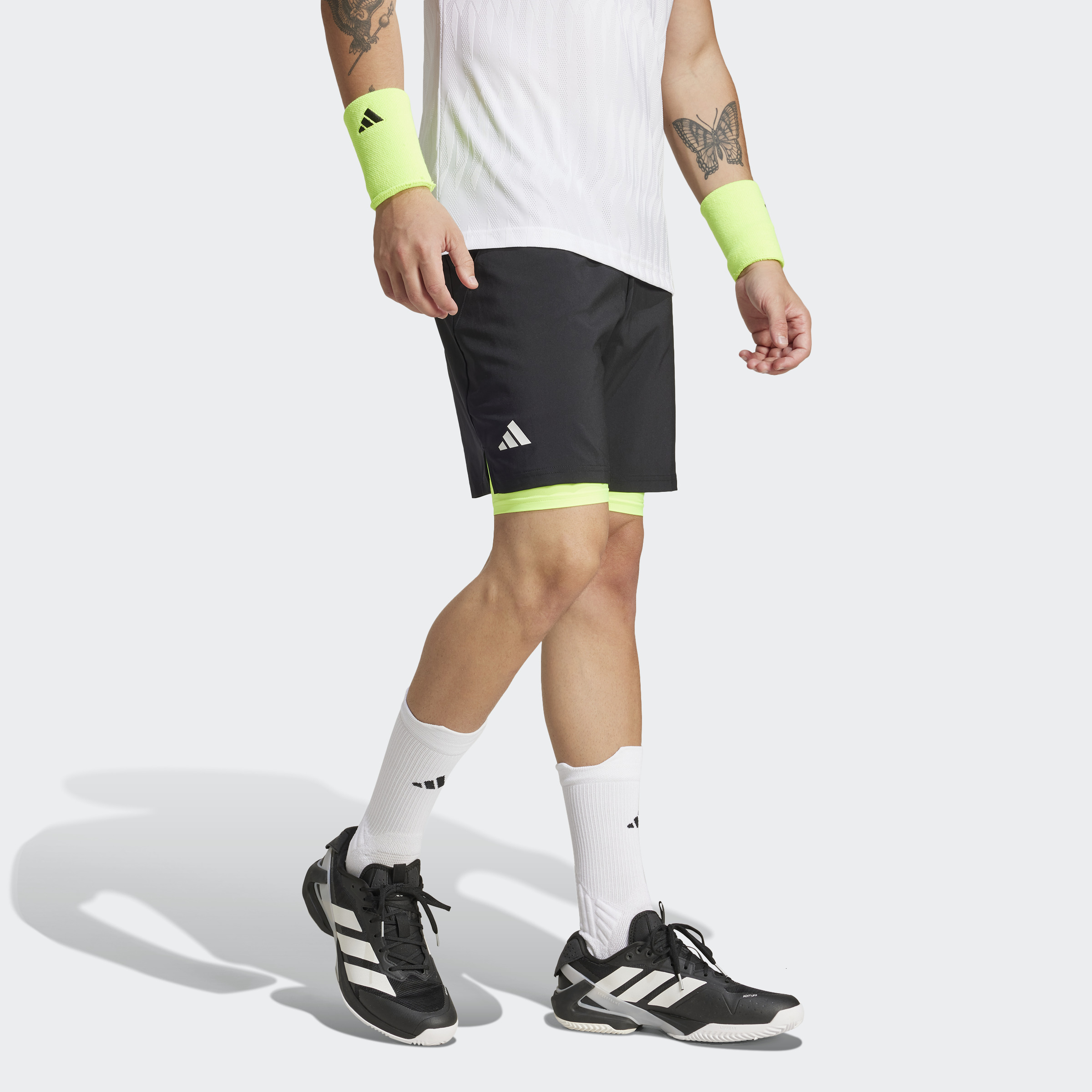 SHORT CLUB 2 EN 1 ADIDAS NOIR ET JAUNE HOMME