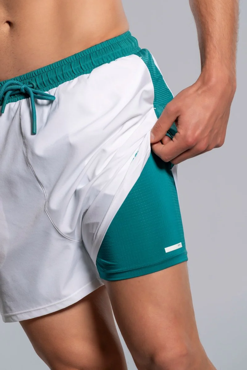 SHORT DE PADEL NOX PRO HOMME BLANC ET VERT IVOIRE 2026